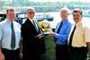 Centurion Safety Products UK Sales Manager David Nevin presents Ivan Ransby with the Centurion Golden Helmet at the Old Custom House in Ipswich.