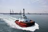 The image shows the Damen ASD Tug 2312 on the water