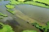 A silt curtain will prevent the spread of sediment during the filling process (Mike Page)