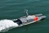The image shows the Ocean Infinity NeedleFish on the water