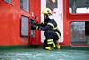 A firefighting suit in operation onboard a vessel