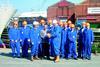 A&amp;P Falmouths managing director Peter Child presents the new apprentices with their personal protective equipment, assisted by training and personnel officer Paul Kneebone.