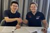 Danny Tao (L) and Luke Foster strike a strategic partnership