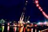Smit sheerlegs Taklift 5 installing steel pylons on Hungerford Bridge in central London.