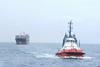 Container ship 'Em Oinousses' under tow by 'RT Spirit' (Kotug)