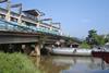 Many of the bridges over the Mekong River are too low to allow inland water transport.