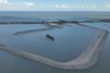 The serial image shows the Dutch Fish Migration River project at the Afsluitdijk