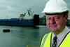 Ipswich Port Manager, Rob Smith, in the foreground and the Ferryways vessel Ipswich Way in the background.