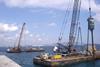 Barge based vibroflots are installing 1,953 vibro stone columns at Algeciras Port.