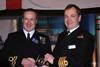 Captain Gavin Pritchard OBE presents a Bravery Medal to Lieutenant Paul Patterson on behalf of the committee of the Tyne Lifeboat Society