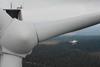 The image shows a drone inspection of a Vattenfall wind turbine