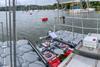 The image shows a USV docked at a centralised hub during the project