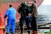 One of the UMC dive team effecting repairs to a vessel at anchor off Malta.