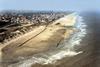 An innovative approach to coastal restoration combining profile nourishments with submerged feeder berm nourishments on the Belgian coast