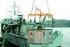 The underwater cofferdam is lowered into position.