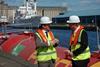 UK Climate Change Minister Greg Baker with Pelamis Wave Power CTO Richard Yemm on the quayside at Leith Docks.