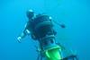 A diver inspects the installation of Sentinel sonar heads and Scylla underwater loudhailers