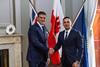 The photo shows John A. Bassadone, founder and CEO of Peninsula, with Aaron Lopez, head of the Maritime Academy University of Gibraltar.