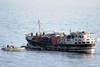 A suspected pirate mother ship is searched by a US Navy patrol.