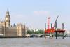 Borehole drilling works underway on the River Thames outside the Houses of Parliament.