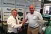 Mike Beacham, MD, Watermota and Peter Smith, MD, Meercat Workboats, shake on the deal