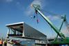 The 41m linkspan is seen halfway through its installation process on the Gosport side of Portsmouth Harbour.