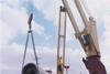 AV Dawson moving a wind turbine to a waiting vessel.