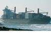 Safmarine Agulhas aground on the South African coast. This vessel is now the subject of a wreck removal tender.