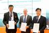 Representatives from Wartsila, CHI and Lloyd's Register sign the concept approval (Wartsila)