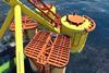 The image shows a TugDock Submersible Platform in action