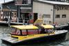 The Rotterdam watertaxi holds 12 people and runs at a top speed of 25 km/h