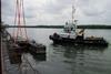 The 'Pasam' is seen here assisting with assembly of its accompanying dredger at Port Harcourt (Damen)