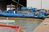 Pollution booms deployed around the damaged tug (MAIB)