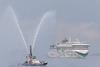 MyStar was brought into harbour by a tugboat with a water cannon display