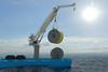 The images shows a Huisman Knuckle Boom Crane performing lifting operations