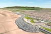 Balfour Beatty will place 128,000 tonnes of rock armour in front of the existing sea defences
