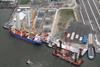 The Port of Mostyn marine renewable energy construction base is seen with operations in full swing during the summer.