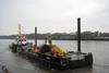 Ruschsand is seen participating in marine construction works on the River Weser with barge DP 4175.