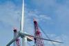 'Rambiz' lifts the assembled wind turbine from the quayside at Nigg harbour.