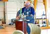 A Rolls-Royce technician overhauls a thruster under optimal workshop conditions.