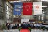 The image shows the steel cutting ceremony at Sanmar’s Altinova Shipyard, launching the build of four battery-powered tugs