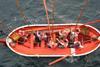 Launching a lifeboat during a mandatory drill.