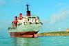 The Turkish vessel Alican Deval hard aground on a rocky ledge in Sicily.