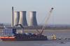 The barge UR101 is seen beached in Pegwell Bay earlier this year while carrying out the shore landing of the export cable for the Thanet Offshore Wind Farm. Photo by Peter Barker