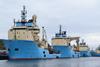 Offshore oil and gas industry vessels crowd Lerwick Harbour in Shetland.