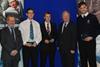 Rear Admiral Sir Jeremy de Halpert KCVO, CB, Deputy Master of Trinity House (left) is seen with winners Steven Walker and Adam Creber, UK shipping minister Mike Penning MP, and winner Simon Curtis.