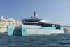 The image shows a SECO Marine catamaran built for Green Navy on the water
