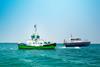 The image shows PD Ports' new Pilot boat and E tug on the water