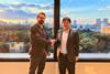 Simon Miller, chief revenue officer at Rovco, clinches the deal with Nobuyuki Takagi, HOM managing director