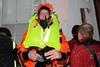 Gudmunder Bragason of Sónar emerges from Rejkavik harbour covered in ice after the successful Kru lifejacket/ R10 demonstration.